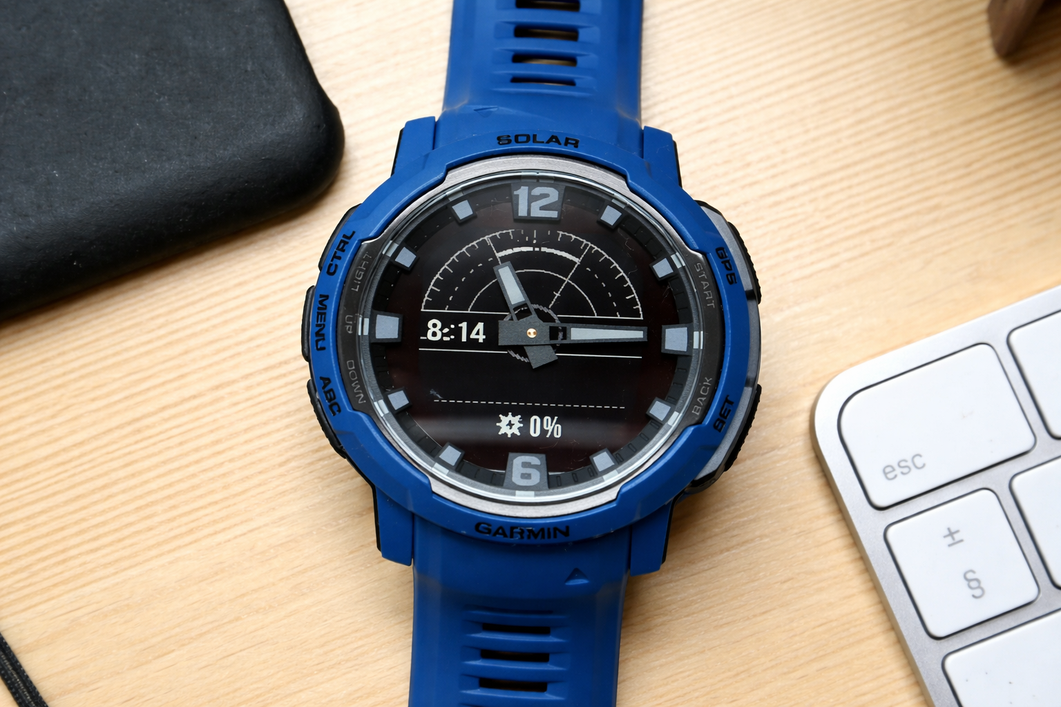 garmin solar powered smartwatch on desk