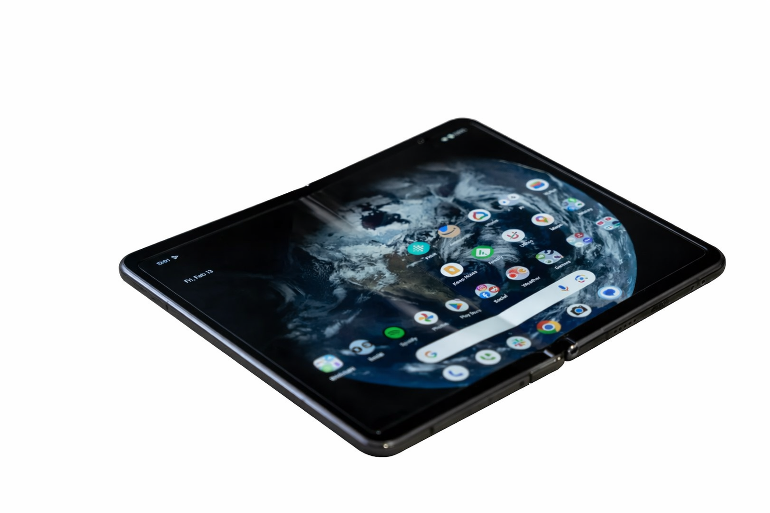 sleek foldable smartphone with earth wallpaper