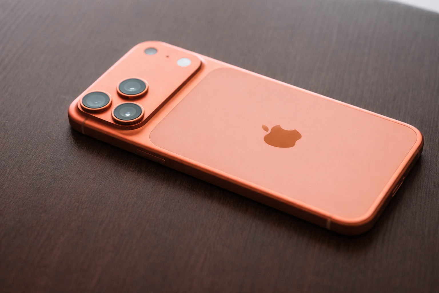 copper iphone close up on wood