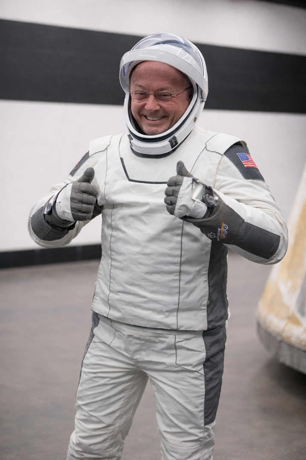 mike fincke in eva suit smiling