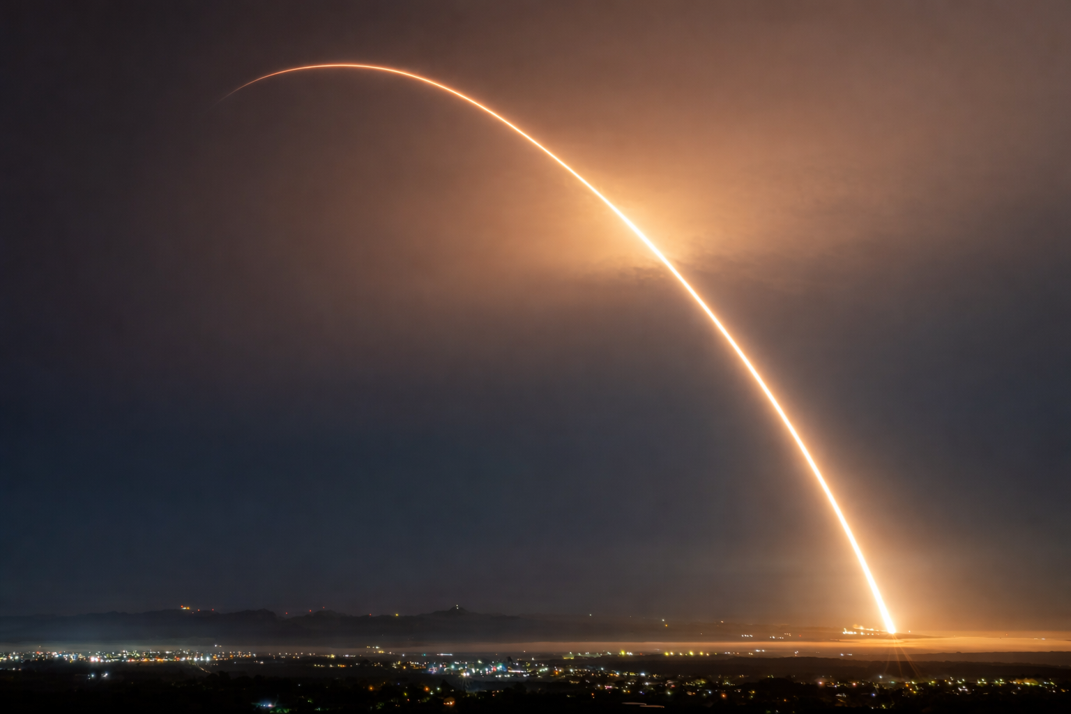 rocket launch under starry sky